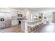 Modern kitchen featuring granite countertops, stainless steel appliances, and bar stool seating at 719 Chazen Way, Longs, SC 29568