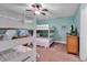 Cozy bedroom with bunk beds and blue walls, perfect for children or guests at 820 Madiera Dr. # 14, North Myrtle Beach, SC 29582