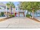 Charming two-story home with a garage and a welcoming entrance at 820 Madiera Dr. # 14, North Myrtle Beach, SC 29582