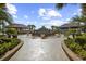 Beautiful tiered fountain with manicured landscaping and covered seating areas at 820 Madiera Dr. # 14, North Myrtle Beach, SC 29582