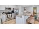 Bright, open kitchen featuring granite counters, stainless appliances, and modern fixtures at 820 Madiera Dr. # 14, North Myrtle Beach, SC 29582