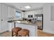 Well-equipped kitchen featuring granite countertops, stainless steel appliances, and white cabinets at 820 Madiera Dr. # 14, North Myrtle Beach, SC 29582