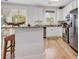 Stylish kitchen featuring stainless steel appliances, granite countertops, and modern lighting at 820 Madiera Dr. # 14, North Myrtle Beach, SC 29582