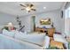 Cozy living room with a ceiling fan, television, and comfortable seating area at 820 Madiera Dr. # 14, North Myrtle Beach, SC 29582