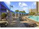 Resort-style pool featuring sun loungers and private cabanas for relaxation at 820 Madiera Dr. # 14, North Myrtle Beach, SC 29582