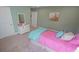Inviting bedroom with a mirror, artwork, and ample natural light at 860 Ireland Dr., Longs, SC 29568
