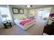 Relaxing bedroom with natural light, neutral carpet, and a bonus sitting area, perfect for reading at 860 Ireland Dr., Longs, SC 29568