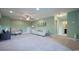 Spacious living room with neutral paint, comfortable seating, and ample natural light at 860 Ireland Dr., Longs, SC 29568