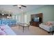 Open concept living area flows into the kitchen, featuring an entertainment center and comfortable seating at 860 Ireland Dr., Longs, SC 29568