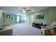 Upstairs living area with neutral paint, comfortable seating, and ample natural light at 860 Ireland Dr., Longs, SC 29568
