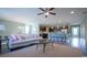 Spacious living and kitchen area with hardwood floors, stainless appliances, and ample seating at 860 Ireland Dr., Longs, SC 29568