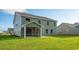 Exterior back of home with screen porch and spacious yard at 867 Ireland Dr., Longs, SC 29568