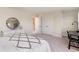Bedroom featuring a dresser with a mirror, a nearby work desk and plush neutral carpeting at 867 Ireland Dr., Longs, SC 29568