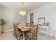 Dining room featuring modern light fixture, wooden table and seating for eight at 867 Ireland Dr., Longs, SC 29568