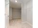 Large walk-in closet with ample shelving and storage space with neutral carpeting at 867 Ireland Dr., Longs, SC 29568