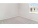Comfortable carpeted bedroom with a window offering natural light at 873 Ireland Dr., Longs, SC 29568