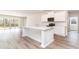 Modern kitchen with a center island, stainless steel appliances, and ample storage space at 873 Ireland Dr., Longs, SC 29568