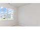 Bright bedroom with a large window offering lots of natural light and backyard views at 885 Ireland Dr., Longs, SC 29568
