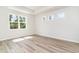 Sun-filled bedroom features large windows and modern flooring for a comfortable living space at 885 Ireland Dr., Longs, SC 29568