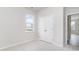 Bright bedroom featuring a window with exterior views and a closet with double doors at 885 Ireland Dr., Longs, SC 29568