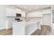 Beautiful kitchen with white cabinets, stainless steel appliances, and an island at 885 Ireland Dr., Longs, SC 29568