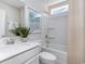 Bright bathroom with single vanity, shower-tub combo, and a neutral color scheme at 890 Ireland Dr., Longs, SC 29568