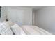 Light and airy bedroom with double closets, a bed with striped linens, and neutral colors at 890 Ireland Dr., Longs, SC 29568