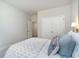Relaxing bedroom showcasing a neatly made bed, closet doors, and calming colors at 890 Ireland Dr., Longs, SC 29568