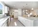 Spacious kitchen with white cabinets, stainless steel appliances and granite countertops at 890 Ireland Dr., Longs, SC 29568