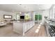 Open-concept kitchen showcases a large island, stainless steel appliances, and natural light at 890 Ireland Dr., Longs, SC 29568