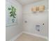 Practical laundry room with essential connections and ample space for organizing laundry tasks at 890 Ireland Dr., Longs, SC 29568