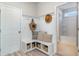 Functional mudroom with coat hooks, bench seating, and storage cubbies at 890 Ireland Dr., Longs, SC 29568