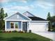 Charming one-story home featuring a blue exterior, well-manicured lawn, and a two-car garage at 896 Cypress Preserve Circle, Longs, SC 29568
