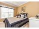 A beautifully appointed bedroom featuring an eye-catching comforter and large window at 912 Berwick Ln., Myrtle Beach, SC 29579