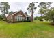 Beautiful brick house with a well-maintained lawn and a view of the surrounding neighborhood at 912 Berwick Ln., Myrtle Beach, SC 29579