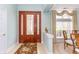 Inviting foyer with an ornate front door and a view of the dining area at 912 Berwick Ln., Myrtle Beach, SC 29579
