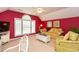 Inviting living room with a sofa, armchair, a ceiling fan, and bright walls and natural light at 912 Berwick Ln., Myrtle Beach, SC 29579