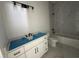 Bathroom showcasing a vanity with black hardware, marble countertops, and subway tile shower at 924 Morrall Dr., North Myrtle Beach, SC 29582