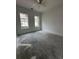 Bright bedroom featuring natural light from two windows and neutral walls and ceiling fan at 924 Morrall Dr., North Myrtle Beach, SC 29582