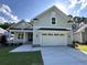 Exterior shot of a well-maintained home with a two-car garage and manicured lawn at 924 Morrall Dr., North Myrtle Beach, SC 29582