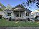 Inviting home exterior with a covered porch, tidy landscaping, and a manicured lawn at 924 Morrall Dr., North Myrtle Beach, SC 29582