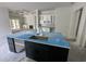 Spacious kitchen features a large island with a sink and ample counter space, perfect for food preparation and entertaining at 924 Morrall Dr., North Myrtle Beach, SC 29582