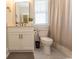 Bathroom with white cabinets, stylish vanity, and elegant finishes at Simpson Creek Dr., Loris, SC 29569