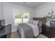 Cozy bedroom with a queen-sized bed, natural light, and neutral decor at Simpson Creek Dr., Loris, SC 29569