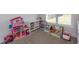 Bright playroom with space for to play and built-in storage at Simpson Creek Dr., Loris, SC 29569