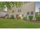 Spacious backyard featuring well-maintained lawn and foliage at 1005 Kelly Ct., Garden City Beach, SC 29576