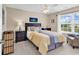 Bedroom featuring natural light, ceiling fan, neutral color scheme, and coastal accents at 1005 Kelly Ct., Garden City Beach, SC 29576