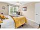 Bedroom featuring natural light, ceiling fan, neutral color scheme, and carpeted floors at 1005 Kelly Ct., Garden City Beach, SC 29576
