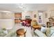 Spacious second living area with TV, wet bar, comfortable seating, and carpeted floor at 1005 Kelly Ct., Garden City Beach, SC 29576