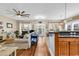 Open-concept living space with hardwood floors, natural light, and modern decor for relaxation and gatherings at 1005 Kelly Ct., Garden City Beach, SC 29576